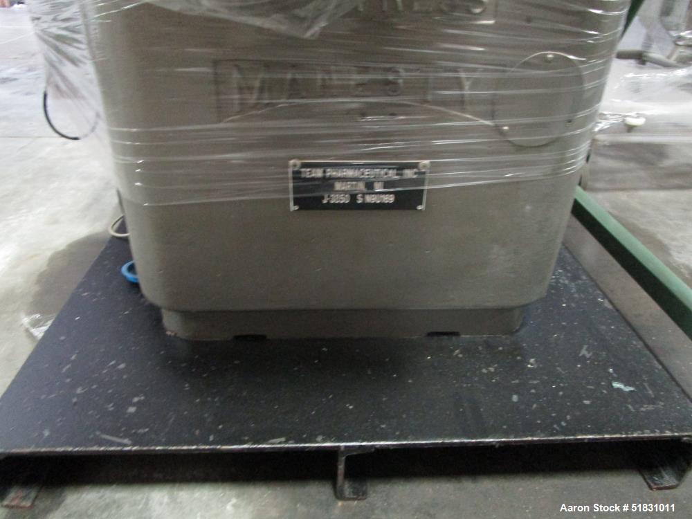 Used Manesty Express Press with precompression. Keyed uppers, b tooling 25 station.