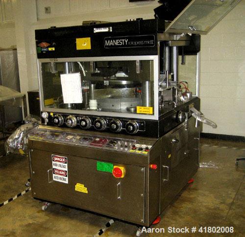 Used Manesty Rotary Tablet Press, Model Rotapress Mark IV, 55 station. 6-1/2 ton compression force with pre-compression 1 ton. Tablet output range per hour 156,000 to 439,800. Double sided. 0.62’’ (1...