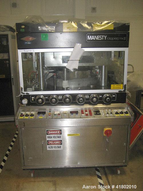 Used Manesty Rotary Tablet Press, Model Rotapress Mark IV, 55 station. 6-1/2 ton compression force with pre-compression 1 ton. Tablet output range per hour 156,000 to 439,800. Double sided. 0.62’’ (1...