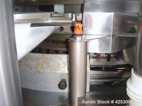 Used Manesty Rotapress MARK IV, 75 Station. B Tooled. Maximum production 600,000 tablets an hour.  7/16" Maximum diameter, 11/16" maximum fill. 65 kN maximum compression, 10 kN pre-compression.
