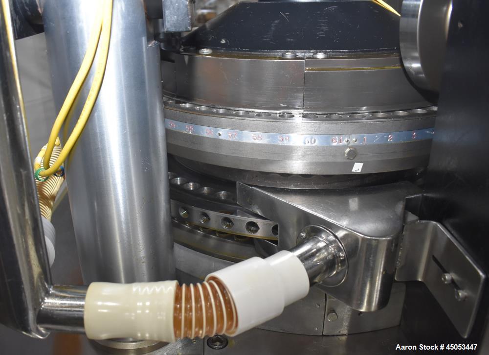 Used Manesty Novapress 61 Station Rotary Tablet Press. Maximum press output 366,000 per hour (single layer). Maximum depth of fill 17.46mm, max tablet diameter 11mm. Precompression 9.81 kN, main comp...