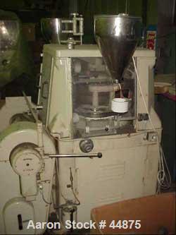 USED: Manesty high speed rotary tablet press, rota press mk11a, 45 stations, double sided keyed head, tablets per min 1640-8200, variable speed, maximum diameter 5/8 (15.8 mm), maximum depth of fill ...