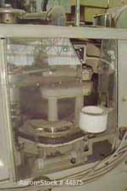 USED: Manesty high speed rotary tablet press, rota press mk11a, 45 stations, double sided keyed head, tablets per min 1640-8200, variable speed, maximum diameter 5/8 (15.8 mm), maximum depth of fill ...