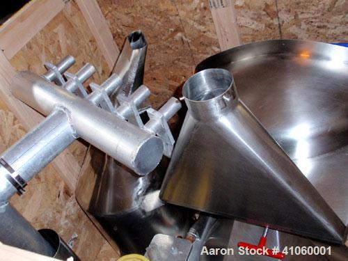 Used Manesty Rotary Tablet Press, Model RS3. 14 station, 15 ton compression force with pre-compression adjustable to 5 tons. Penetration of the punch adjustable from 0 to 1/2". 2-3/4" maximum tablet ...