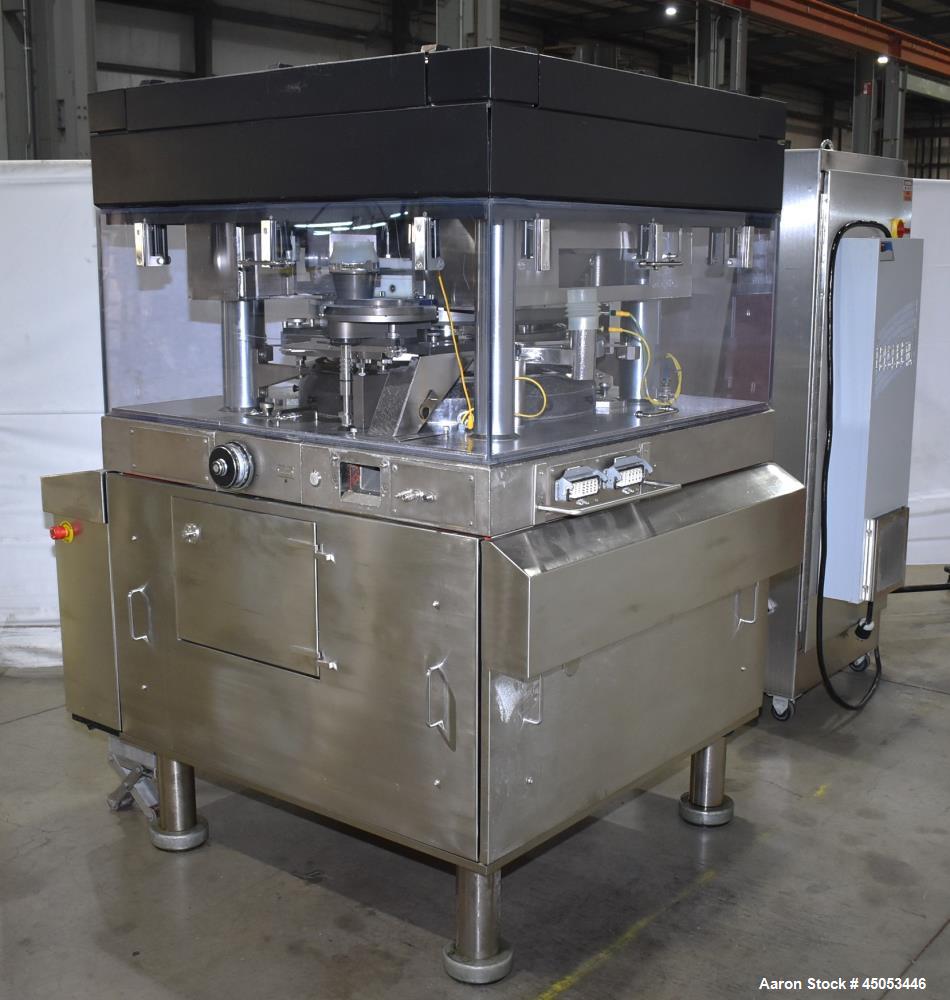 Used Manesty Mark IV 75 Station Rotary Tablet Press. Max press output 600,300 per hour (single layer), 300,150 per hour (bi-layer). Max depth of fill 17.46mm, max tablet diameter 11mm. Pre-compressio...