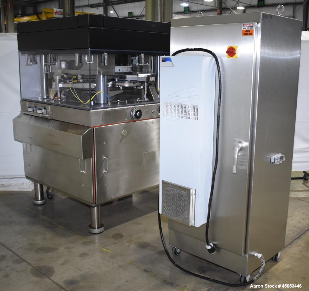 Used Manesty Mark IV 75 Station Rotary Tablet Press. Max press output 600,300 per hour (single layer), 300,150 per hour (bi-layer). Max depth of fill 17.46mm, max tablet diameter 11mm. Pre-compressio...
