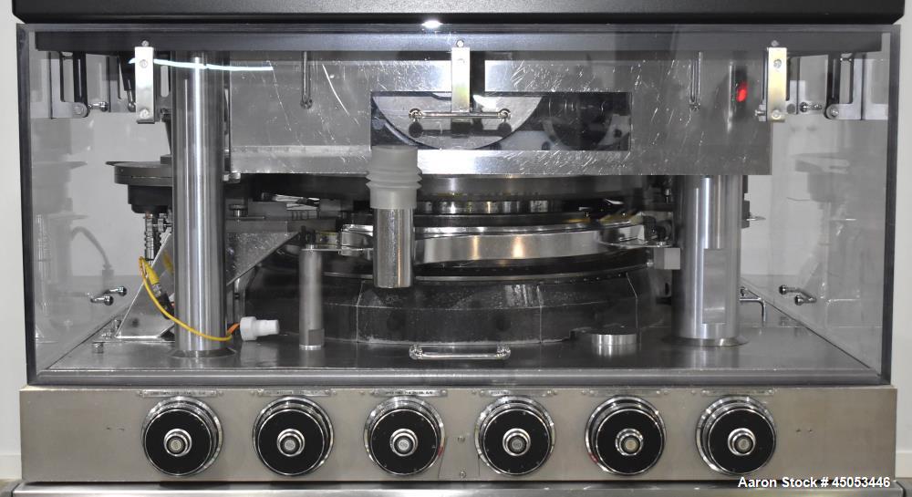 Used Manesty Mark IV 75 Station Rotary Tablet Press. Max press output 600,300 per hour (single layer), 300,150 per hour (bi-layer). Max depth of fill 17.46mm, max tablet diameter 11mm. Pre-compressio...