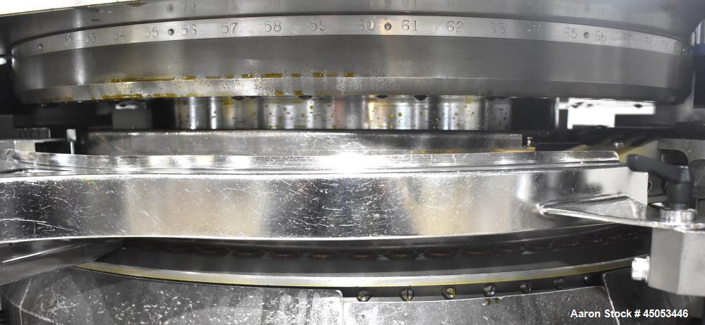Used Manesty Mark IV 75 Station Rotary Tablet Press. Max press output 600,300 per hour (single layer), 300,150 per hour (bi-layer). Max depth of fill 17.46mm, max tablet diameter 11mm. Pre-compressio...
