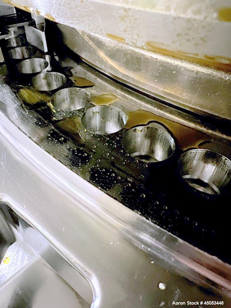 Used Manesty Mark IV 75 Station Rotary Tablet Press. Max press output 600,300 per hour (single layer), 300,150 per hour (bi-layer). Max depth of fill 17.46mm, max tablet diameter 11mm. Pre-compressio...