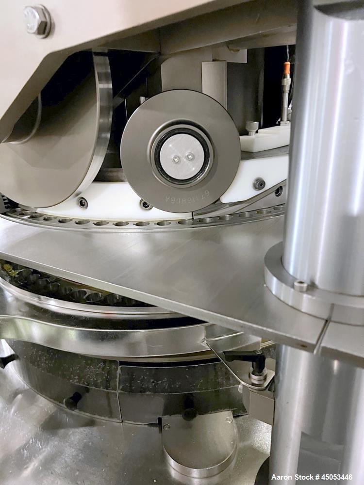 Used Manesty Mark IV 75 Station Rotary Tablet Press. Max press output 600,300 per hour (single layer), 300,150 per hour (bi-layer). Max depth of fill 17.46mm, max tablet diameter 11mm. Pre-compressio...