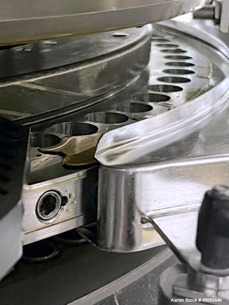 Used Manesty Mark IV 75 Station Rotary Tablet Press. Max press output 600,300 per hour (single layer), 300,150 per hour (bi-layer). Max depth of fill 17.46mm, max tablet diameter 11mm. Pre-compressio...