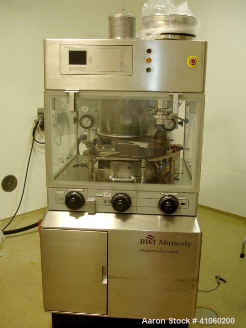 Used BWI Manesty Rotary Tablet Press, Model Unipress Diamond. 20 station. 10 ton compression force with pre-compression 1 ton. Tablet output range per hour 21,429 to 150,000. Single sided with force ...