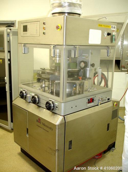Used BWI Manesty Rotary Tablet Press, Model Unipress Diamond. 20 station. 10 ton compression force with pre-compression 1 ton. Tablet output range per hour 21,429 to 150,000. Single sided with force ...