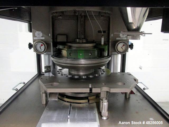 Used BWI Manesty Rotary Tablet Press, Model Unipress. 20 Station, keyed upper punch guides, 10 ton main compression, 1 ton pre compression, 25.4 mm diameter, 21 mm depth of fill, D tooled, single sid...