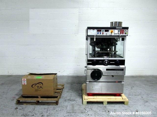 Used BWI Manesty Rotary Tablet Press, Model Unipress. 20 Station, keyed upper punch guides, 10 ton main compression, 1 ton pre compression, 25.4 mm diameter, 21 mm depth of fill, D tooled, single sid...
