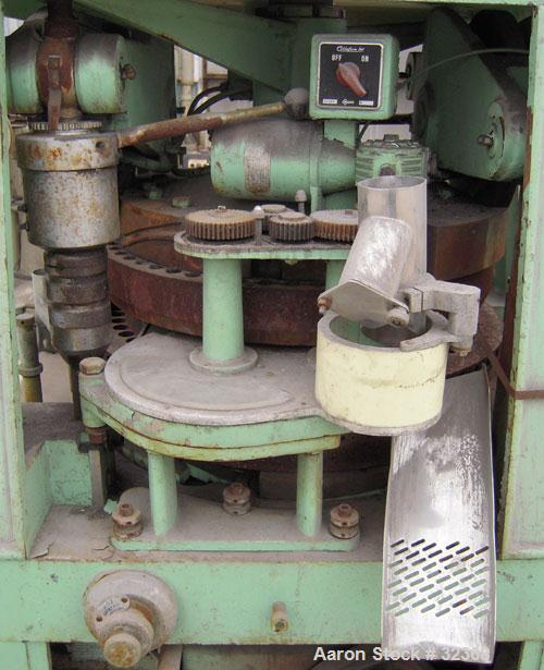 Used Manesty "Rota Press" Mark IIA High Speed Rotary Tablet. Double sided, approximate 6 1/2 ton, keyed head. Maximum depth of fill 11/16". Maximum diameter 7/16". Compacts 2,000 to 10,000 per minute...