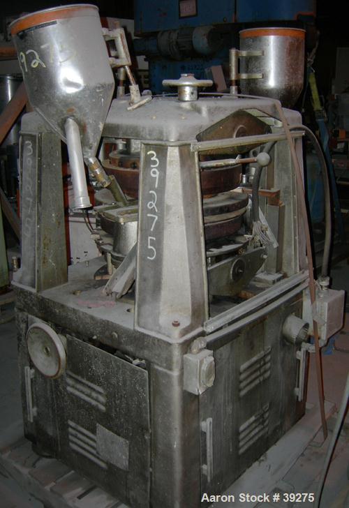 Used Manesty Tablet Press, Layer Press Series 47. 3 Layer, (47) 1" diameter holes,  420-1500 layer tablets per minute. Max diameter 7/16" (11.1mm), max depth of fill 11/16" (17.4mm), max layer before...