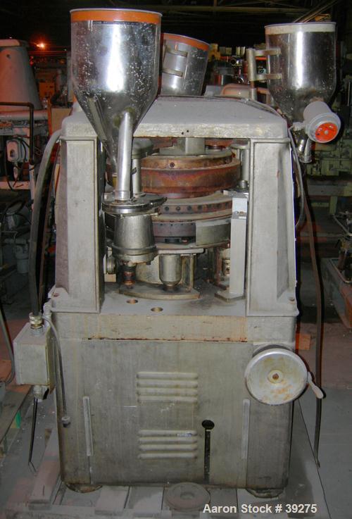 Used Manesty Tablet Press, Layer Press Series 47. 3 Layer, (47) 1" diameter holes,  420-1500 layer tablets per minute. Max diameter 7/16" (11.1mm), max depth of fill 11/16" (17.4mm), max layer before...