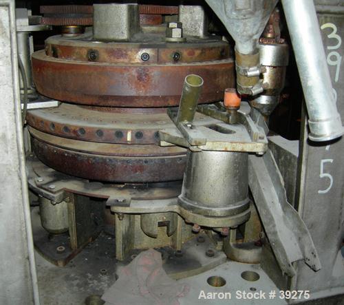 Used Manesty Tablet Press, Layer Press Series 47. 3 Layer, (47) 1" diameter holes,  420-1500 layer tablets per minute. Max diameter 7/16" (11.1mm), max depth of fill 11/16" (17.4mm), max layer before...