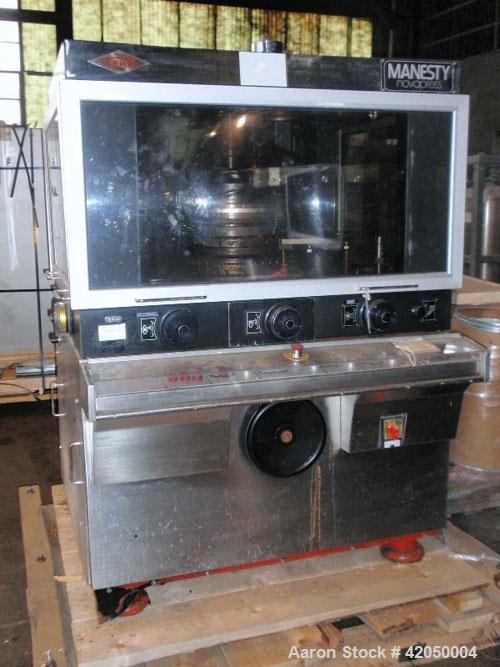 Used Manesty Novapress Tablet Press. 61 stations, keyed upper punch guide, single side, serial# 15873.