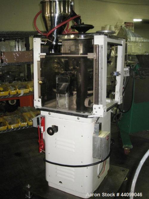 Used Manesty Beta Press Rotary Tablet Press, 16 station, keyed upper punch guide, single sided, provision for force feed with hopper, precompression, 6.5 ton total compression pressure, 5/8" maximum ...