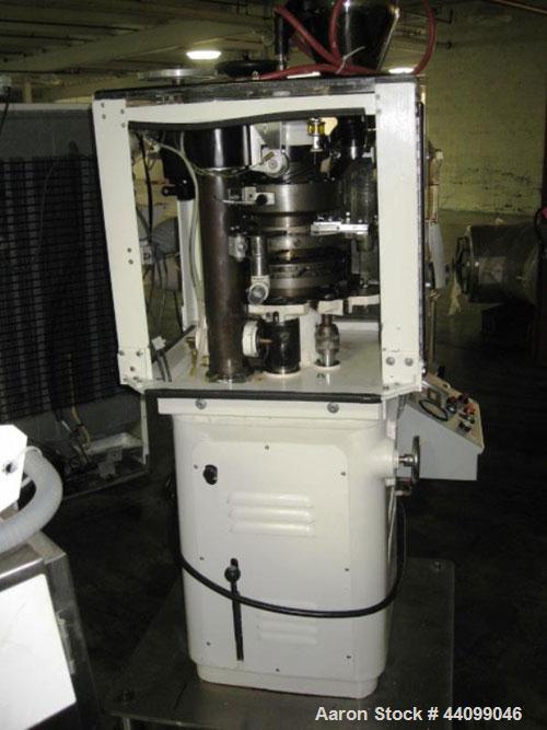 Used Manesty Beta Press Rotary Tablet Press, 16 station, keyed upper punch guide, single sided, provision for force feed with hopper, precompression, 6.5 ton total compression pressure, 5/8" maximum ...