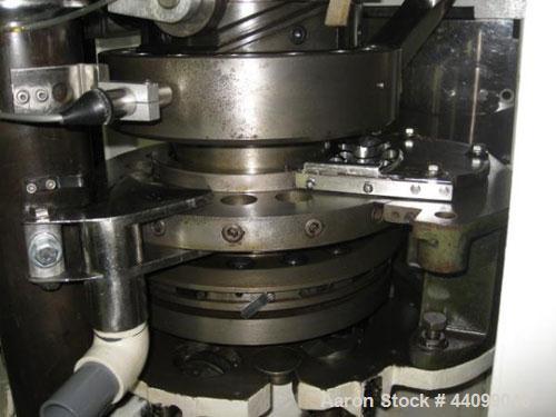 Used Manesty Beta Press Rotary Tablet Press, 16 station, keyed upper punch guide, single sided, provision for force feed with hopper, precompression, 6.5 ton total compression pressure, 5/8" maximum ...