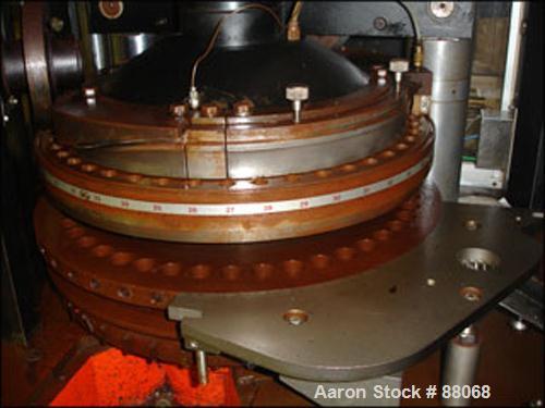 Used Manesty Novapress Rotary Tablet Press, 61 Station, 6.5 ton total compression with pre-compression. 7/16" max tablet diameter, 11/16" max depth of fill, rated up to 366,000 tablets per hour, keye...