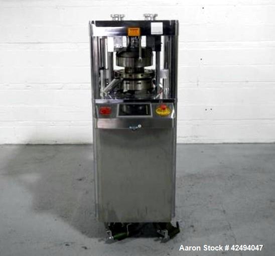 Used Riva Piccola Bi Layer rotary tablet press, model PI-BB-11, 11 station, 60 Kn main compression, 5 Kn precomprssion, keyed upper punch guide, force feeders on each layer, 16 mm max tablet diameter...