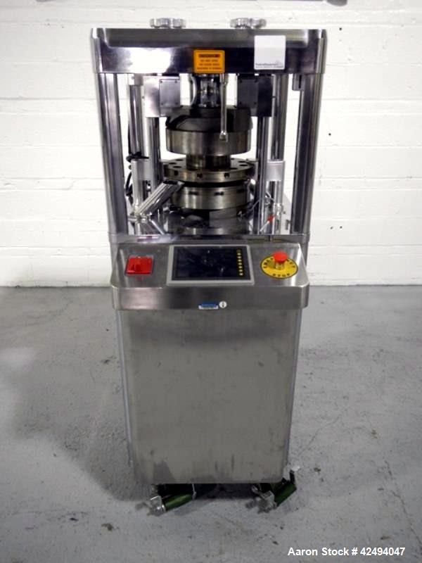 Used Riva Piccola Bi Layer rotary tablet press, model PI-BB-11, 11 station, 60 Kn main compression, 5 Kn precomprssion, keyed upper punch guide, force feeders on each layer, 16 mm max tablet diameter...