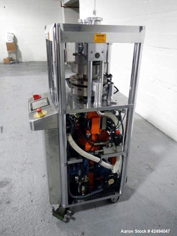 Used Riva Piccola Bi Layer rotary tablet press, model PI-BB-11, 11 station, 60 Kn main compression, 5 Kn precomprssion, keyed upper punch guide, force feeders on each layer, 16 mm max tablet diameter...