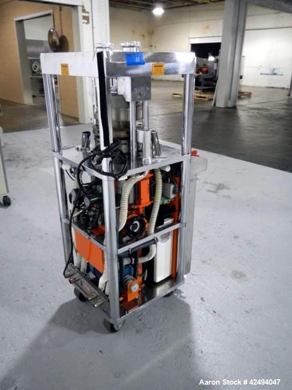 Used Riva Piccola Bi Layer rotary tablet press, model PI-BB-11, 11 station, 60 Kn main compression, 5 Kn precomprssion, keyed upper punch guide, force feeders on each layer, 16 mm max tablet diameter...