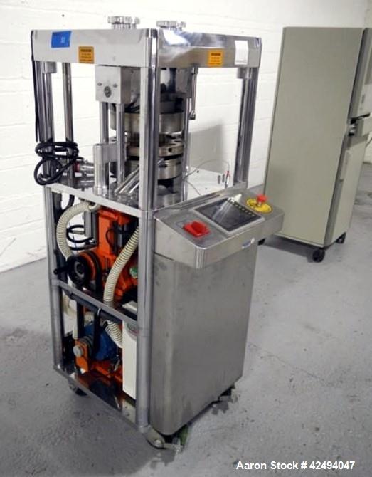 Used Riva Piccola Bi Layer rotary tablet press, model PI-BB-11, 11 station, 60 Kn main compression, 5 Kn precomprssion, keyed upper punch guide, force feeders on each layer, 16 mm max tablet diameter...