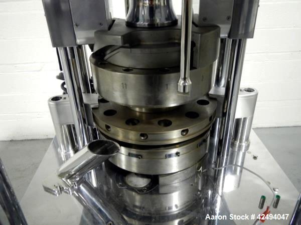 Used Riva Piccola Bi Layer rotary tablet press, model PI-BB-11, 11 station, 60 Kn main compression, 5 Kn precomprssion, keyed upper punch guide, force feeders on each layer, 16 mm max tablet diameter...