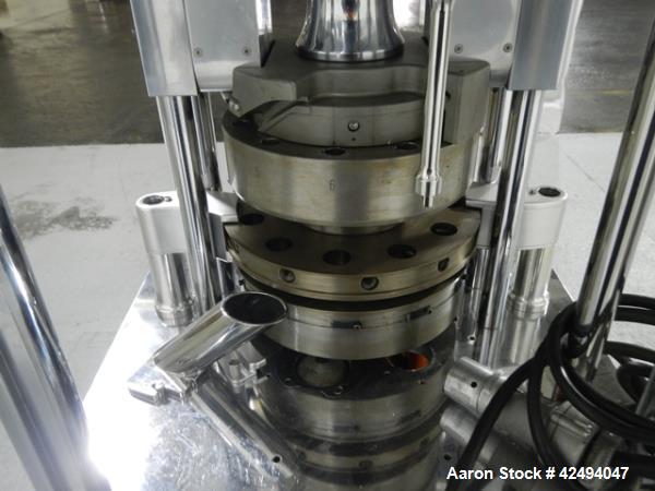 Used Riva Piccola Bi Layer rotary tablet press, model PI-BB-11, 11 station, 60 Kn main compression, 5 Kn precomprssion, keyed upper punch guide, force feeders on each layer, 16 mm max tablet diameter...