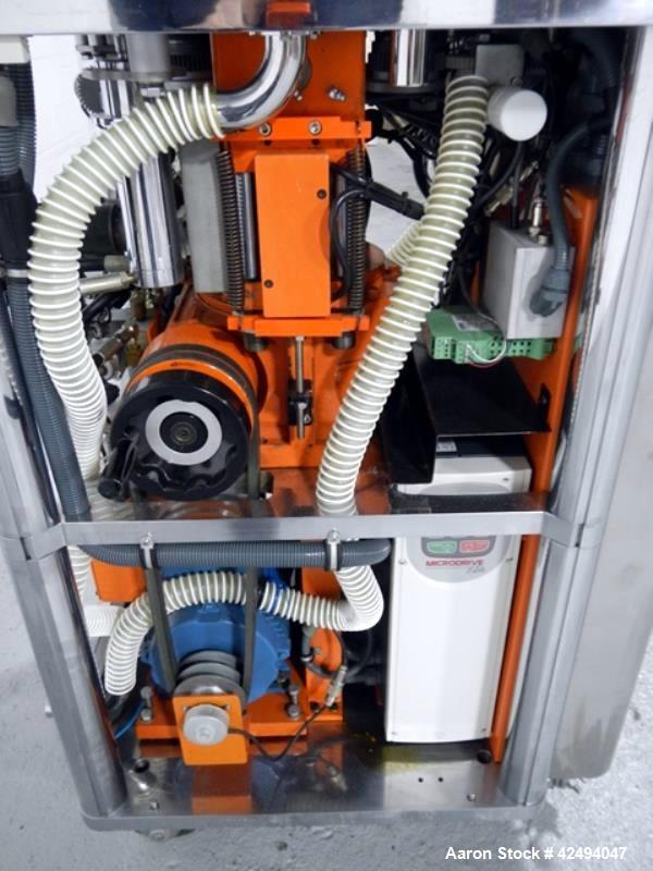 Used Riva Piccola Bi Layer rotary tablet press, model PI-BB-11, 11 station, 60 Kn main compression, 5 Kn precomprssion, keyed upper punch guide, force feeders on each layer, 16 mm max tablet diameter...