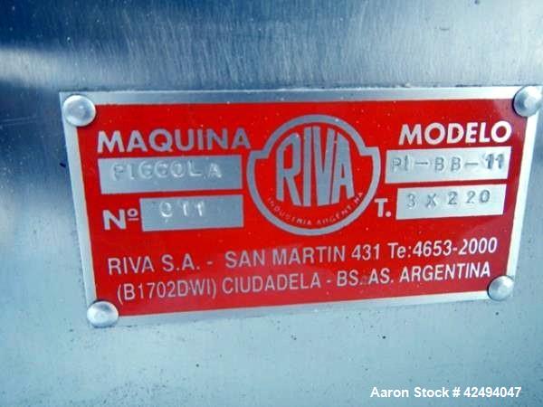 Used Riva Piccola Bi Layer rotary tablet press, model PI-BB-11, 11 station, 60 Kn main compression, 5 Kn precomprssion, keyed upper punch guide, force feeders on each layer, 16 mm max tablet diameter...