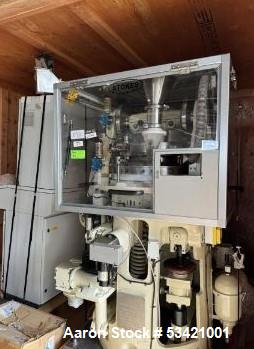 Used Stokes Rotary Tablet Press, 11 Station. Model 557 with controls.