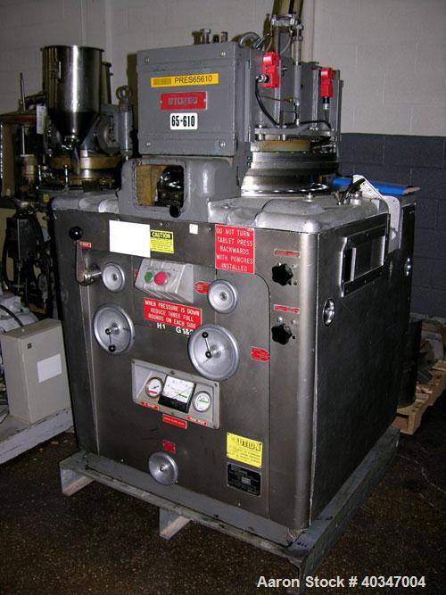 Used Stokes rotary tablet press, model 900-328-2. 33 station, 10 ton compression force, 1 3/16" max tablet diameter, 1 3/8" max depth of fill, with feed hoppers and frames, rated up to 3300 tablets/m...