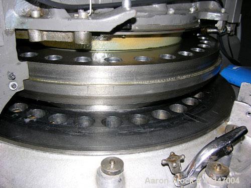 Used Stokes rotary tablet press, model 900-328-2. 33 station, 10 ton compression force, 1 3/16" max tablet diameter, 1 3/8" max depth of fill, with feed hoppers and frames, rated up to 3300 tablets/m...