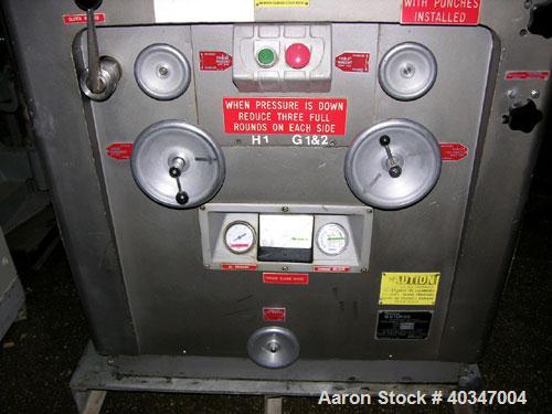 Used Stokes rotary tablet press, model 900-328-2. 33 station, 10 ton compression force, 1 3/16" max tablet diameter, 1 3/8" max depth of fill, with feed hoppers and frames, rated up to 3300 tablets/m...