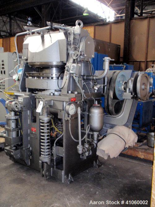 Used Stokes Rotary Tablet Press, Model 900-342-1. 15 station, 0 to 35 tons operating pressure with pre-compression. 3-1/2" maximum tablet diameter. Depth of fill first layer 1/4" to 1-3/4", second la...