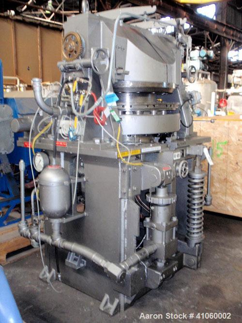 Used Stokes Rotary Tablet Press, Model 900-342-1. 15 station, 0 to 35 tons operating pressure with pre-compression. 3-1/2" maximum tablet diameter. Depth of fill first layer 1/4" to 1-3/4", second la...