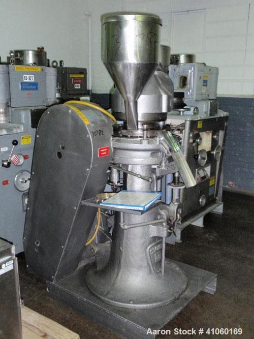 Used Stokes Rotary Tablet Press, Model D3-15. 15 station, keyed upper punch guide, 7 ton compression pression, 15/16" max tablet diameter, 13/16" max depth of fill with feed frame and hopper. Driven ...
