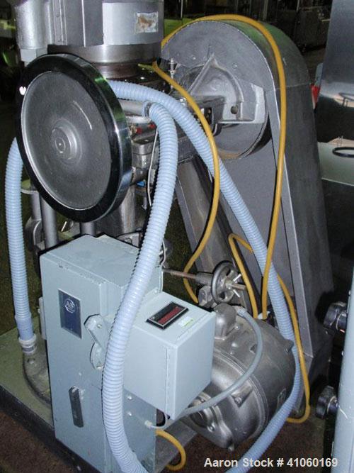 Used Stokes Rotary Tablet Press, Model D3-15. 15 station, keyed upper punch guide, 7 ton compression pression, 15/16" max tablet diameter, 13/16" max depth of fill with feed frame and hopper. Driven ...