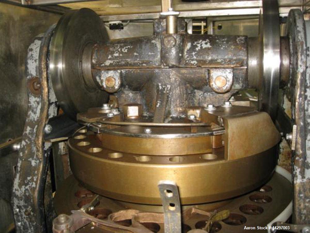 Used Stokes DD2 Rotary Tablet Press. 23 Station, 15 ton compression pressure, 1 3/16" max tablet diameter, 1 3/8" depth of fill, keyed upper punch guides, dual sided with feed frames, rated up to 720...