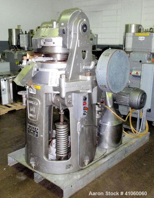 Used Stokes Single Sided Rotary Tablet Press, Model DDS-2 (557). 11 station, approximately 15 tons operating pressure. 3-1/2" maximum tablet diameter. Adjustable depth of fill 3/4" to 2-1/16". Output...