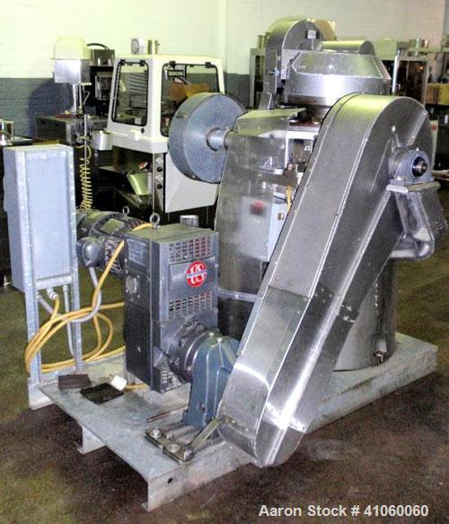 Used Stokes Single Sided Rotary Tablet Press, Model DDS-2 (557). 11 station, approximately 15 tons operating pressure. 3-1/2" maximum tablet diameter. Adjustable depth of fill 3/4" to 2-1/16". Output...