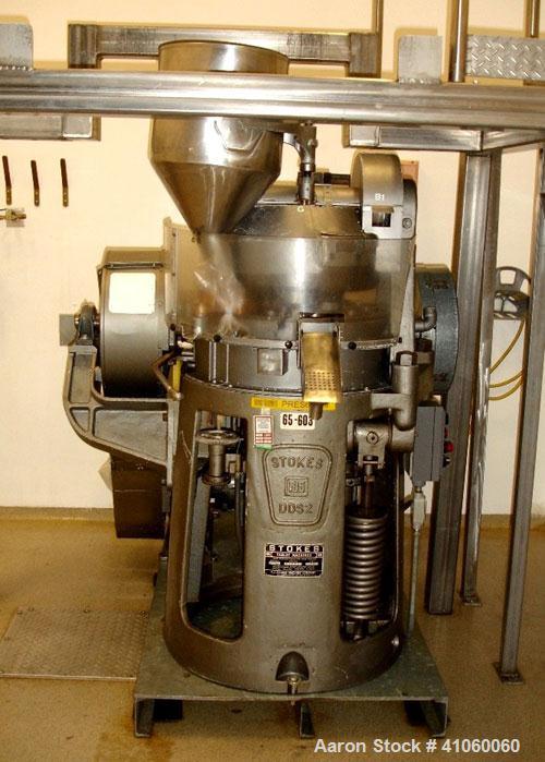 Used Stokes Single Sided Rotary Tablet Press, Model DDS-2 (557). 11 station, approximately 15 tons operating pressure. 3-1/2" maximum tablet diameter. Adjustable depth of fill 3/4" to 2-1/16". Output...