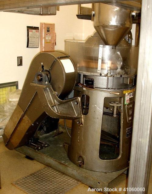 Used Stokes Single Sided Rotary Tablet Press, Model DDS-2 (557). 11 station, approximately 15 tons operating pressure. 3-1/2" maximum tablet diameter. Adjustable depth of fill 3/4" to 2-1/16". Output...